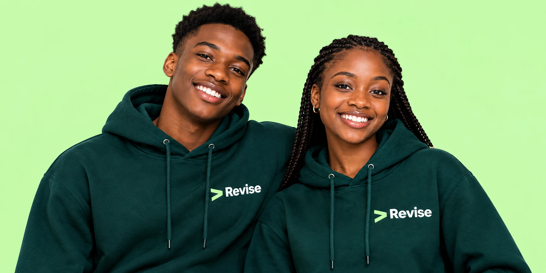 Two young founders in Revise hoodies