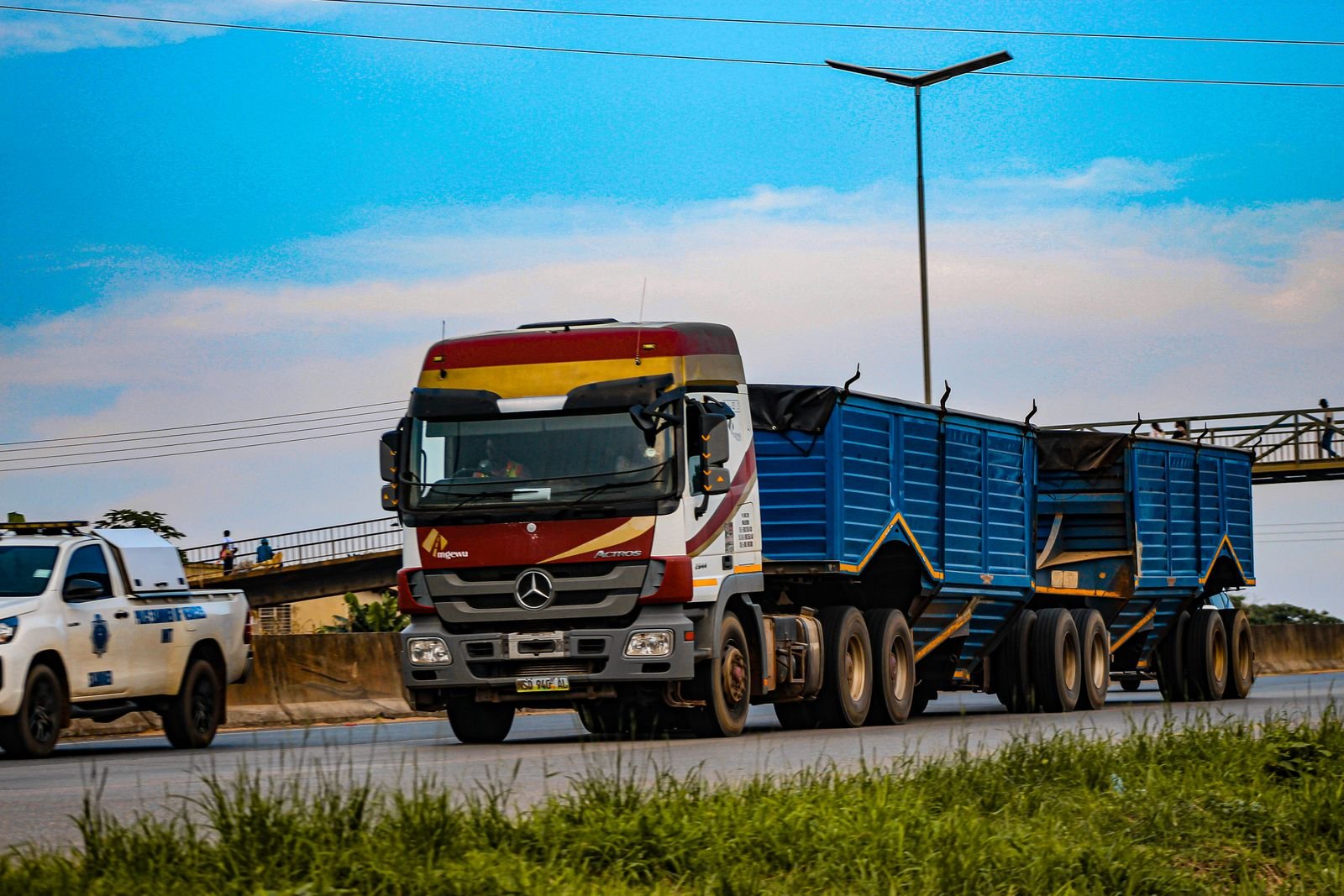 A heavy truck with a trailer on a highway in Mankayane, Eswatini